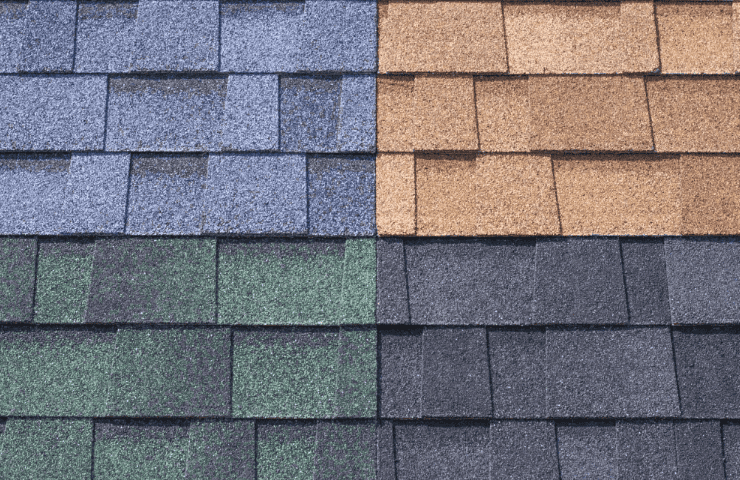 Colorful asphalt shingle roofing samples in various shades for residential roofs.