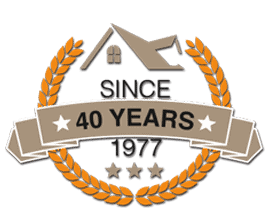 Shamrock roofing logo celebrating 40 years since 1977.