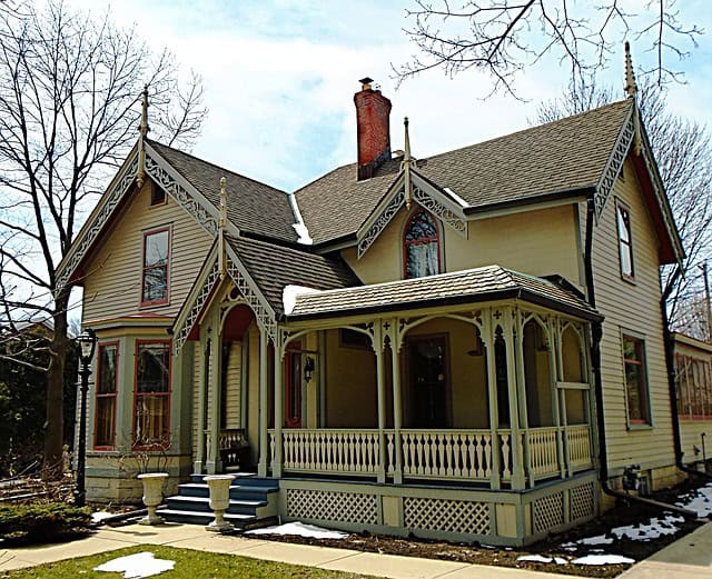 Exquisite Victorian-style home with roof and gutter repair by Shamrock Roofing and Construction.