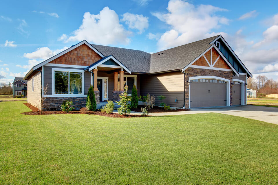 roofing centerton ar-stone and wood sided house with gray shingled roof