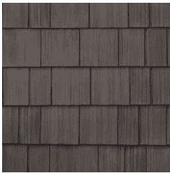 Weathered wood shingle roof showing natural texture and dark gray finish.