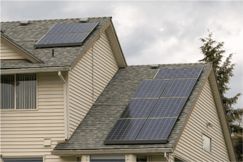 Solar panels installed on a residential roof for energy efficiency and solar power generation.