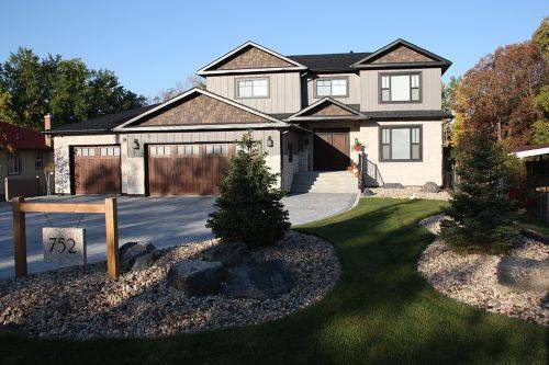 Luxury home with durable roofing and construction by Shamrock Roofing and Construction.