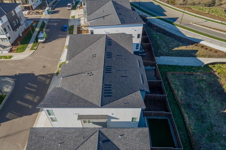 composition shingles-aerial view of new roofs on a neighborhood development